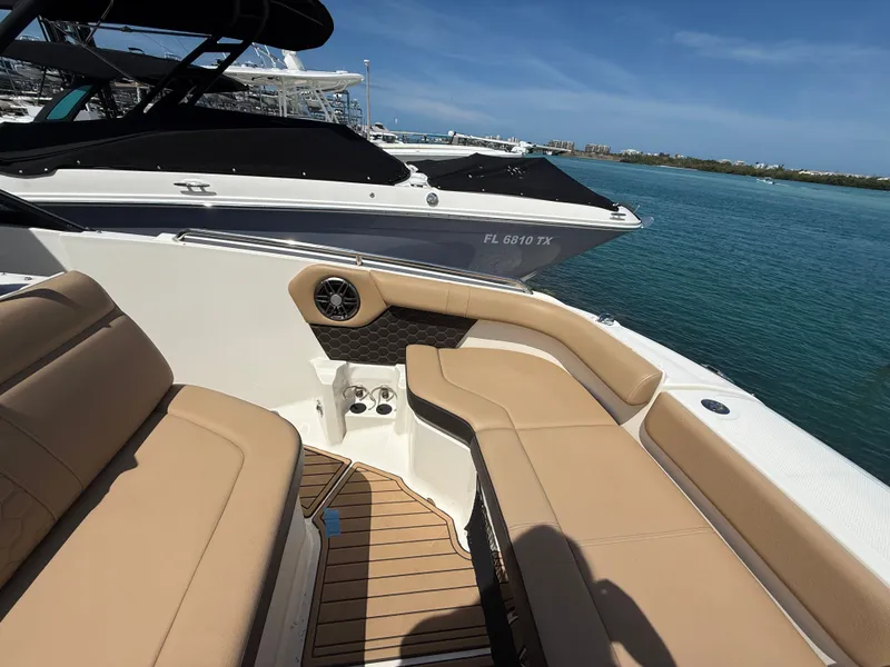 Slide: The Image of Interior of 2023 Sea Ray SDX 250 Outboard with storage and toilet. - 12
