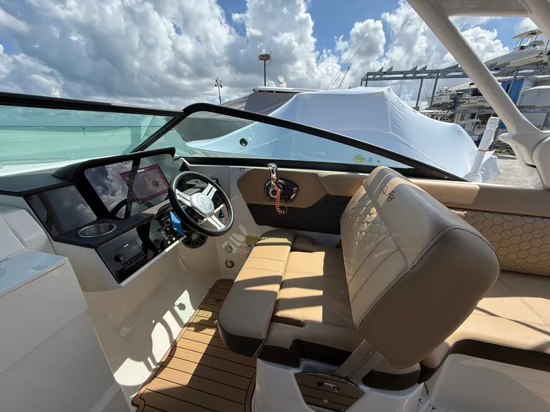 Slide: The Image of Interior of a 2023 Sea Ray SDX 250 Outboard boat. - 13