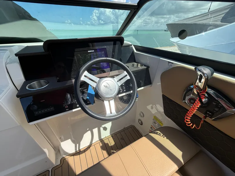 Slide: The Image of Interior of a 2023 Sea Ray SDX 250 Outboard boat. - 14