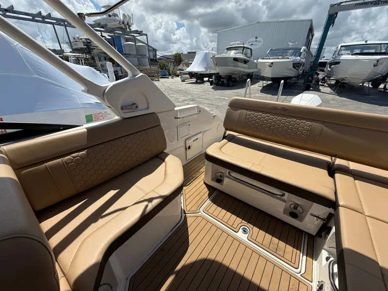 Slide: The Image of 2023 Sea Ray SDX 250 Outboard with luxurious interior and sunshade. - 19