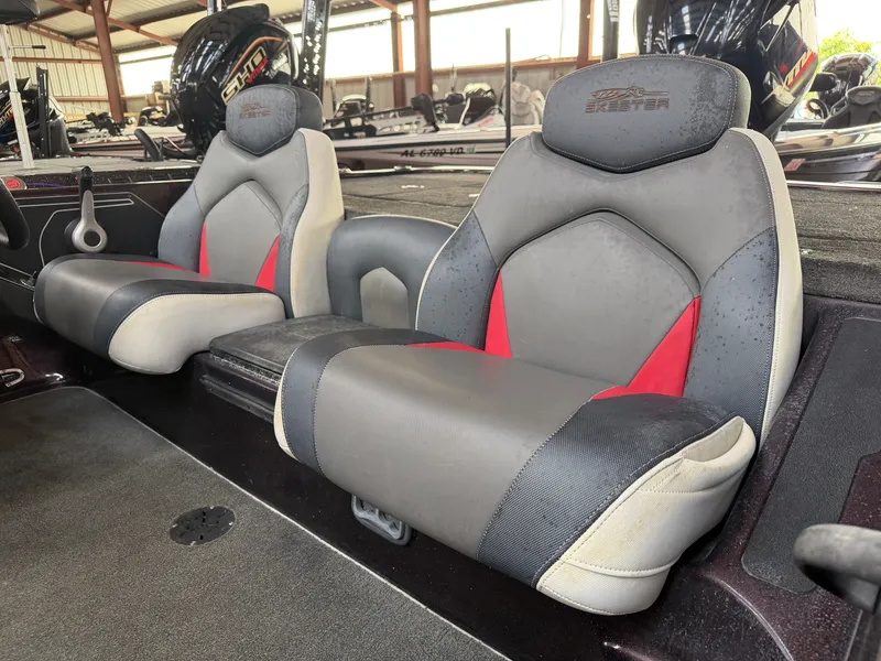 Slide: The Image of 2017 Skeeter ZX225 boat seats in a storage facility. - 11