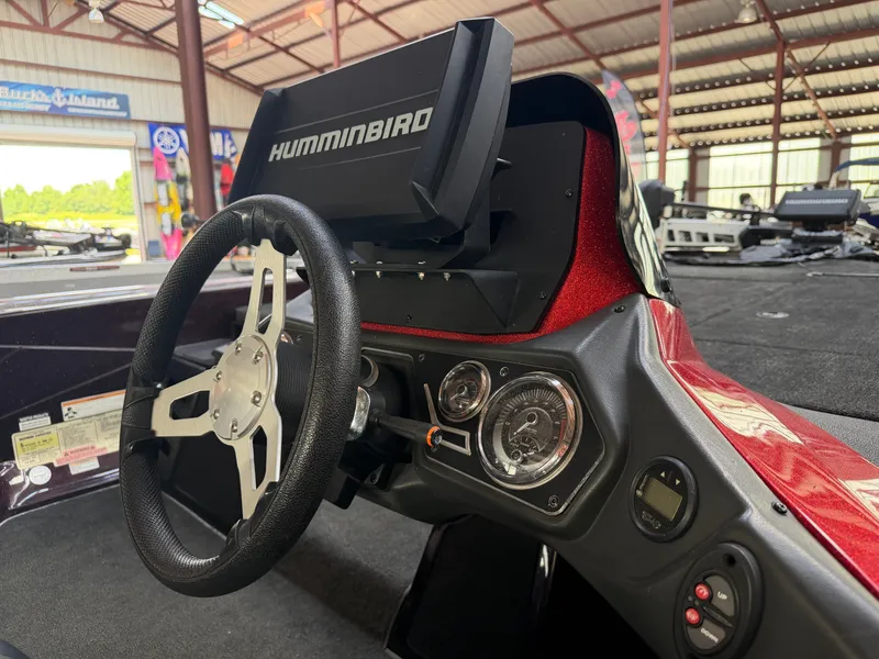 Slide: The Image of Interior view of a 2017 Skeeter ZX225 boat with Humminbird display. - 16