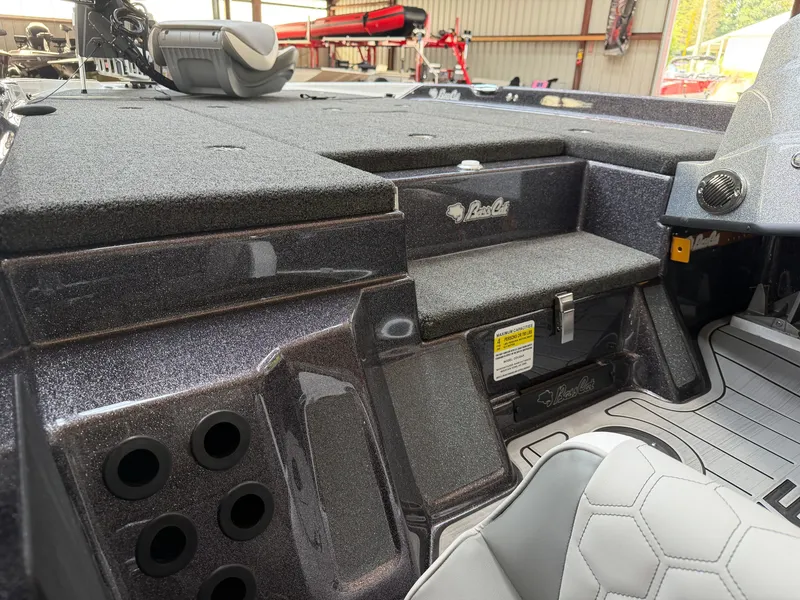Slide: The Image of Interior of 2026 Bass Cat Cougar FTD SP with gray upholstery. - 11