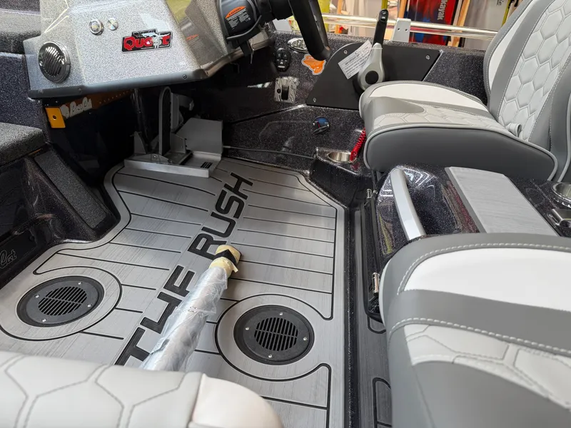 Slide: The Image of Interior of 2026 Bass Cat Cougar FTD SP with gray seating. - 12