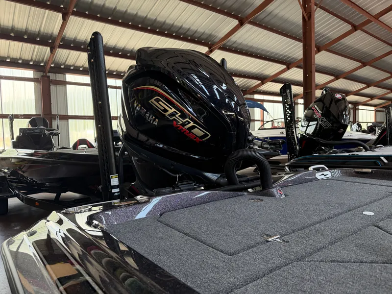 Slide: The Image of 2026 Bass Cat Cougar FTD SP with Yamaha engine in warehouse. - 17
