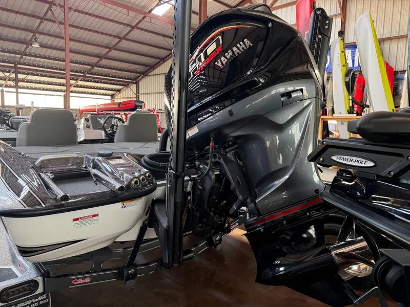 Slide: The Image of 2026 Bass Cat Cougar FTD SP with Yamaha engine in warehouse. - 18