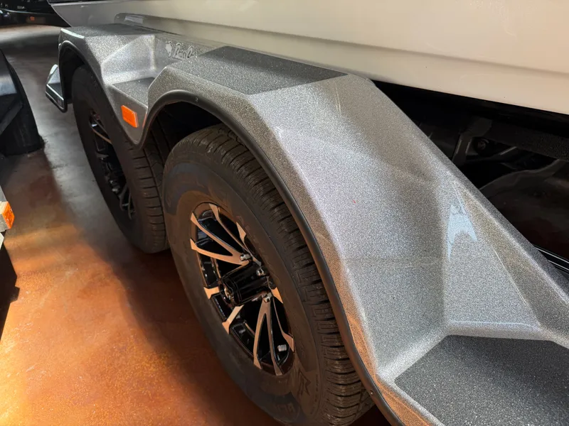 Slide: The Image of 2026 Bass Cat Cougar FTD SP trailer with shiny fender. - 22