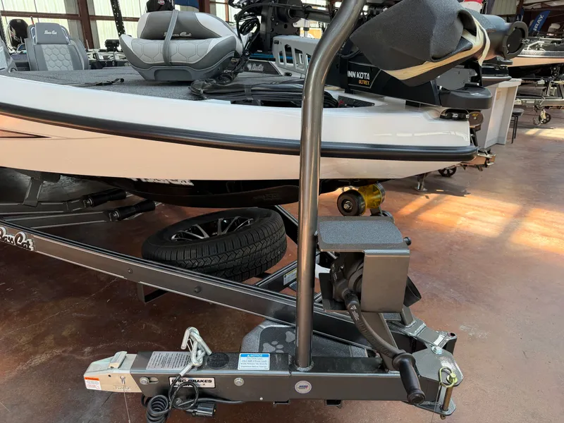 Slide: The Image of 2026 Bass Cat Cougar FTD SP on trailer in showroom. - 23