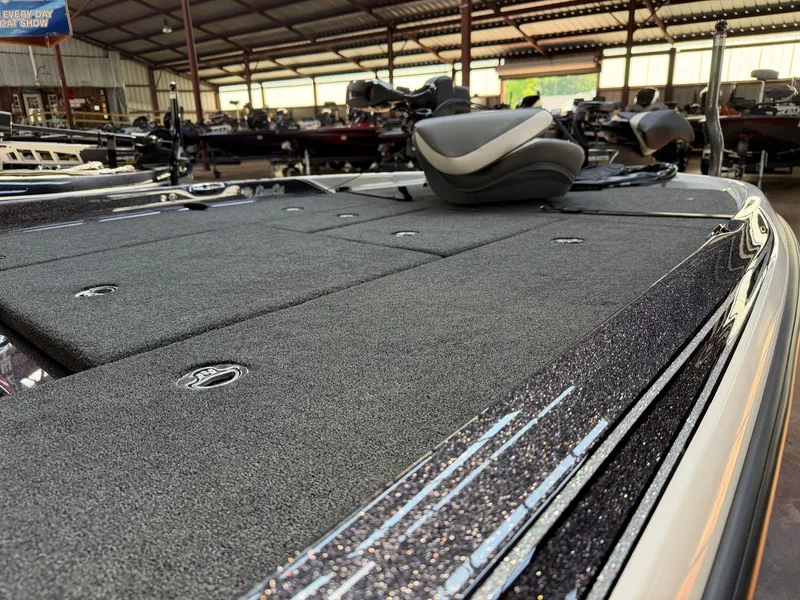 Slide: The Image of 2026 Bass Cat Cougar FTD SP in showroom, close-up of deck. - 5