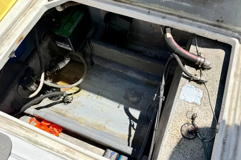 Slide: The Image of Open engine compartment of 2000 BAJA CRUISER King Cat 340 boat. - 35