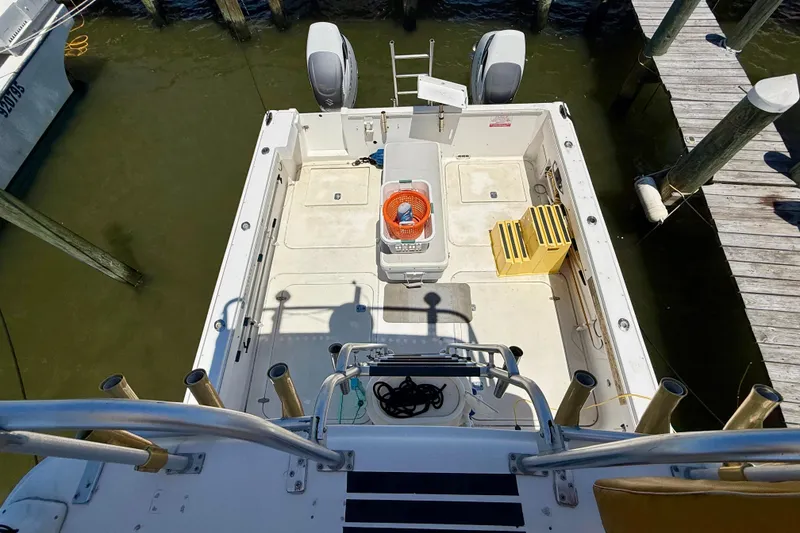 Slide: The Image of 2000 BAJA CRUISER King Cat 340 boat docked, aerial view of deck and equipment. - 64