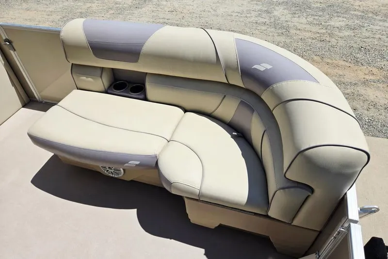 Slide: The Image of Luxurious seating on 2019 Starcraft EX 20 C boat, featuring beige and gray upholstery. - 10