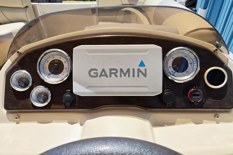 Slide: The Image of Dashboard of 2019 Starcraft EX 20 C boat featuring Garmin navigation system. - 20