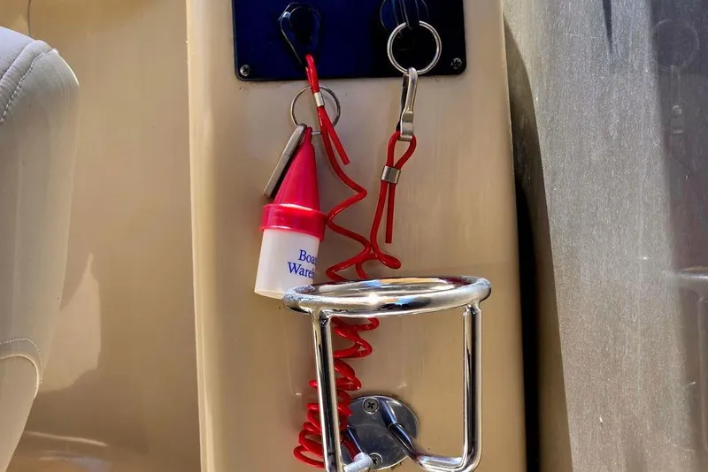 Slide: The Image of 2019 Starcraft EX 20 C boat ignition with safety lanyard and key holder. - 22