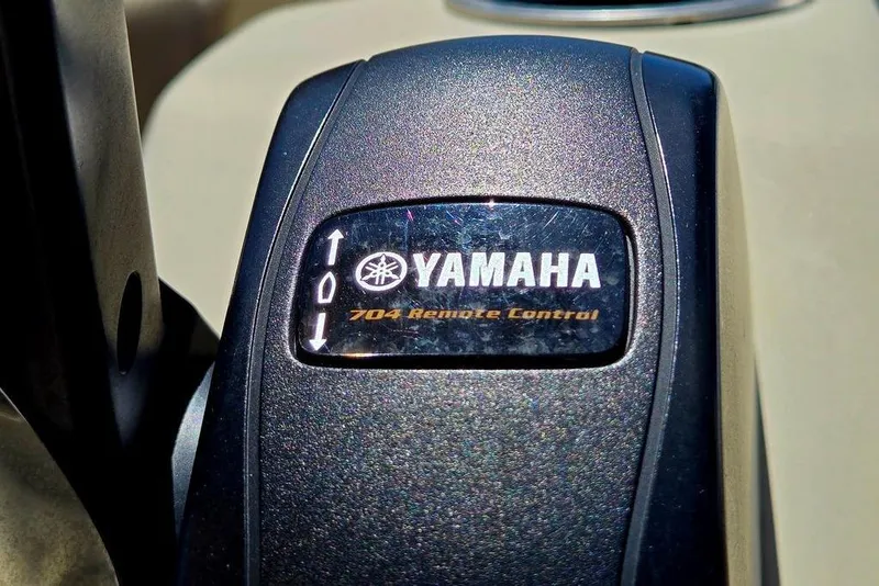 Slide: The Image of Close-up of Yamaha 704 remote control on 2019 Starcraft EX 20 C boat. - 28