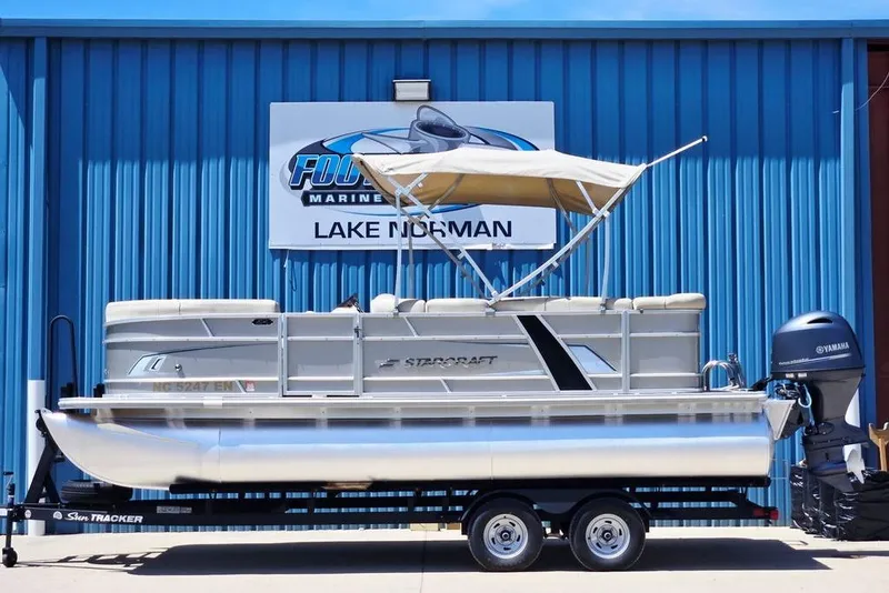Slide: The Image of 2019 Starcraft EX 20 C pontoon boat with Yamaha motor at dealership. - 3