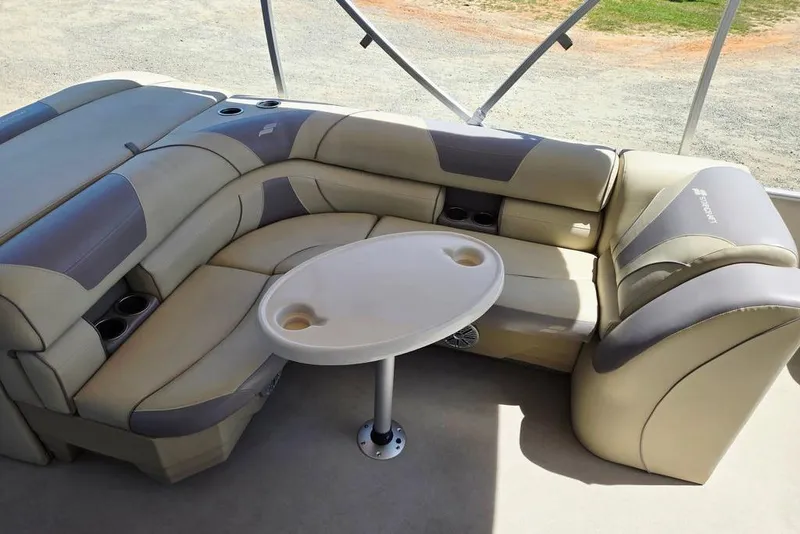 Slide: The Image of Luxurious seating area on a 2019 Starcraft EX 20 C pontoon boat. - 34