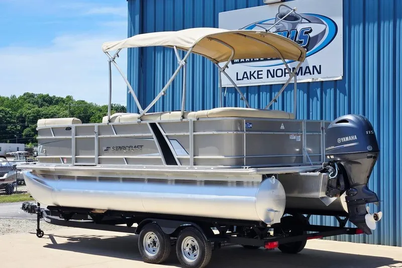 Slide: The Image of 2019 Starcraft EX 20 C pontoon boat with Yamaha motor on trailer. - 38