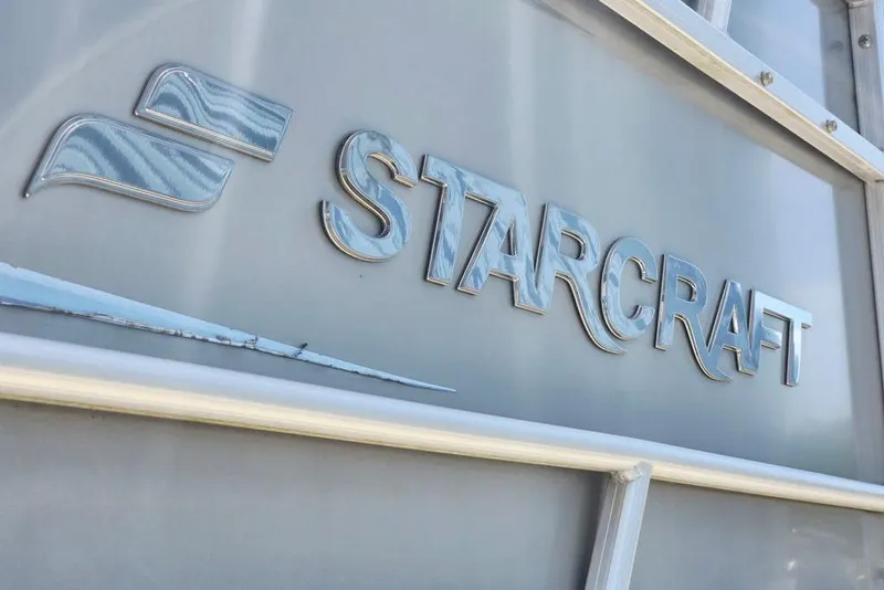 Slide: The Image of 2019 Starcraft EX 20 C logo on metallic surface. - 5