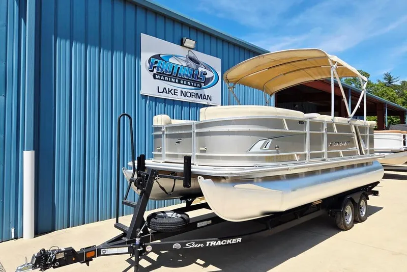 Slide: The Image of 2019 Starcraft EX 20 C pontoon boat on trailer at Foothills Marine Center, Lake Norman. - 6