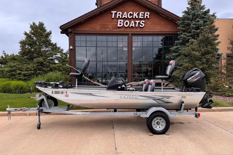 The Image of 2019 Lowe Skorpion 16 boat on trailer outside Tracker Boats dealership. - 0
