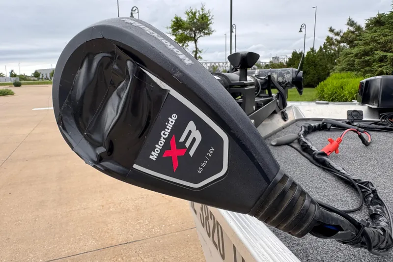 Slide: The Image of MotorGuide X3 trolling motor on 2019 Lowe Skorpion 16 boat, parked outdoors. - 4