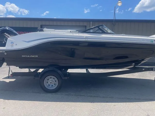 The Image of 2023 Bayliner DX 2000 boat on trailer, side view. - 1