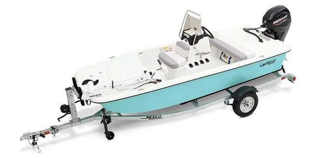 The Image of 2026 Mako Pro Skiff 13 CC on trailer, turquoise and white. - 1