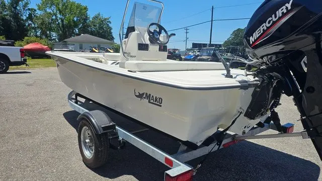 Slide: The Image of 2026 Mako Pro Skiff 13 CC on trailer with Mercury engine. - 6