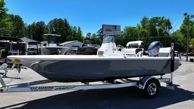 Slide: The Image of 2026 Tidewater Bay Max 1910 boat on trailer outdoors. - 10