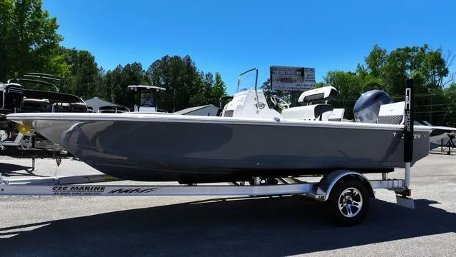 Slide: The Image of 2026 Tidewater Bay Max 1910 boat on trailer outdoors. - 3