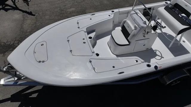 Slide: The Image of 2026 Tidewater Bay Max 1910 boat, aerial view, white deck design. - 5