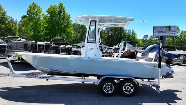 The Image of 2026 Tidewater Bay Max 2110 boat on trailer outdoors. - 1