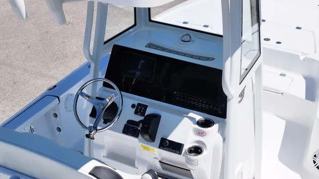 Slide: The Image of Interior view of 2026 Tidewater Bay Max 2110 boat cockpit. - 10