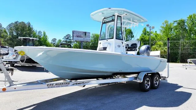 Slide: The Image of 2026 Tidewater Bay Max 2110 boat on trailer outdoors. - 2