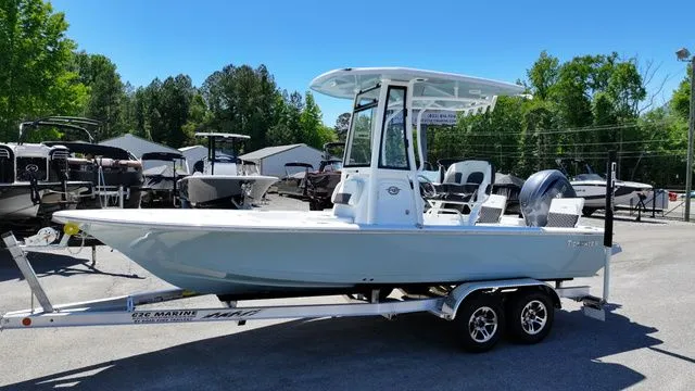Slide: The Image of 2026 Tidewater Bay Max 2110 boat on trailer outdoors. - 3