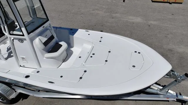 Slide: The Image of 2026 Tidewater Bay Max 2110 boat on trailer, front view. - 7