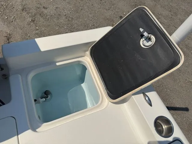 Slide: The Image of Open storage compartment on Key West 188 Bay Reef boat, 2023 model. - 12