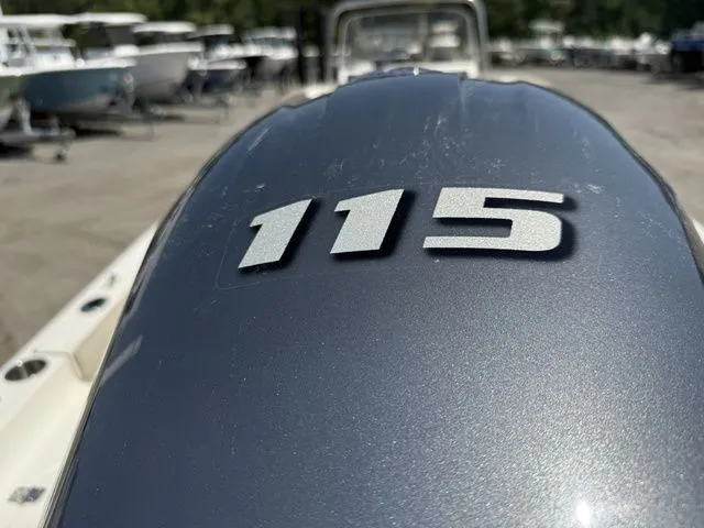 Slide: The Image of Close-up of 115 horsepower engine on Key West 188 Bay Reef boat. - 14