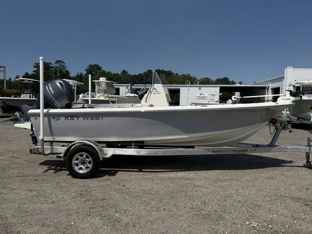 Slide: The Image of 2023 Key West 188 Bay Reef boat on trailer. - 3