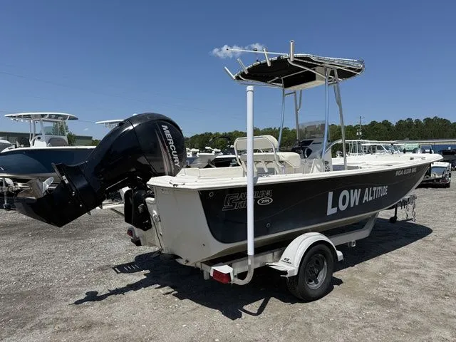 Slide: The Image of 2015 Carolina Skiff DLV 218 boat with outboard motor. - 3