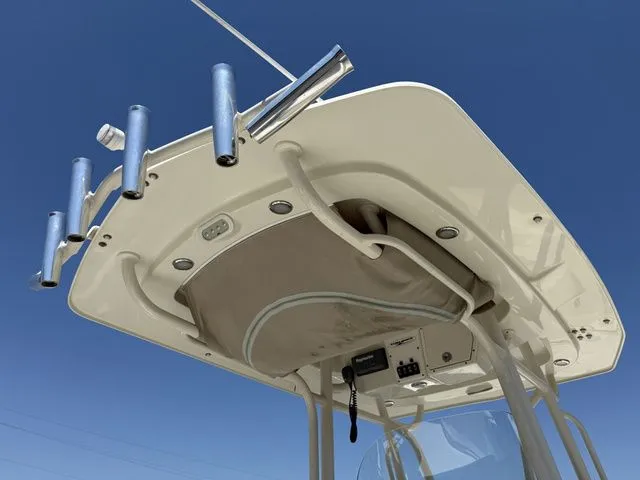 Slide: The Image of Hydra-Sports 2300 CC 2012 boat top with fishing rod holders. - 14
