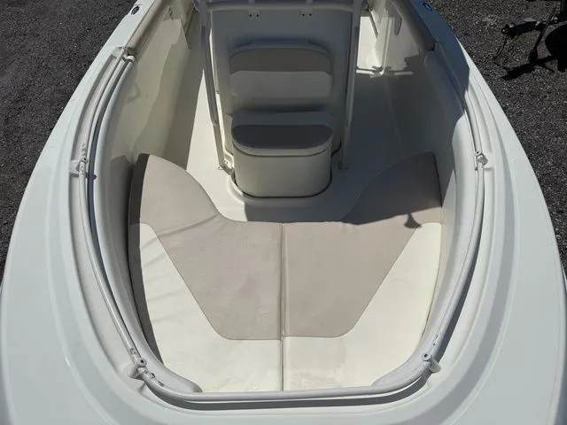 Slide: The Image of Interior view of a 2012 Hydra-Sports 2300 CC boat with seating area. - 16
