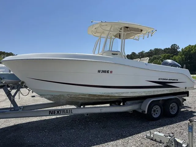 Slide: The Image of 2012 Hydra-Sports 2300 CC boat on trailer outdoors. - 4