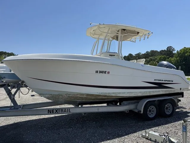 Slide: The Image of 2012 Hydra-Sports 2300 CC boat on trailer outdoors. - 5