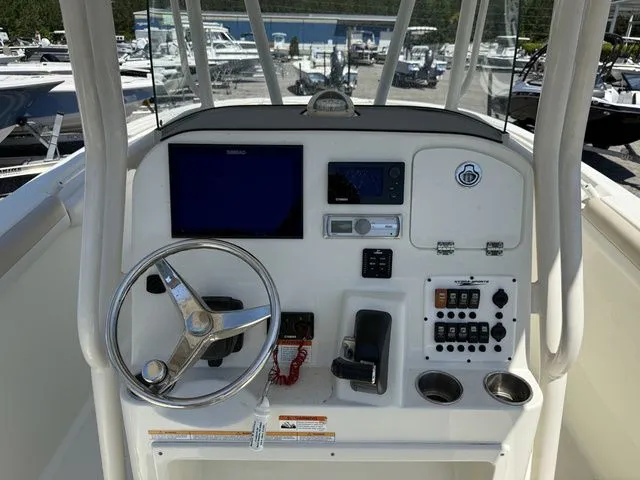 Slide: The Image of Control console of a 2012 Hydra-Sports 2300 CC boat. - 9