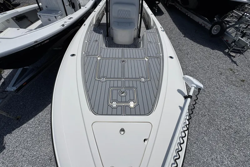 Slide: The Image of 2019 ShearWater 270 Carolina Flare boat deck with gray non-slip surface and seating. - 17