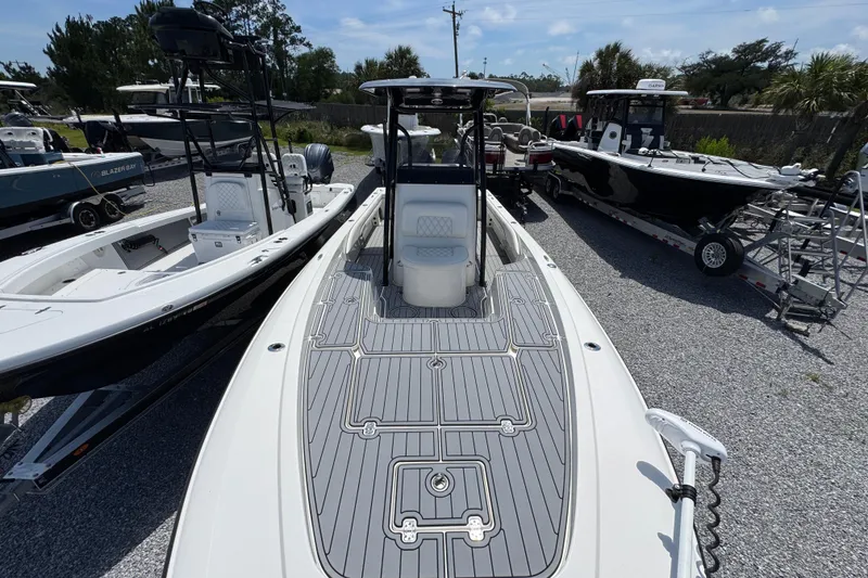 Slide: The Image of 2019 ShearWater 270 Carolina Flare boat displayed in a marina setting. - 18