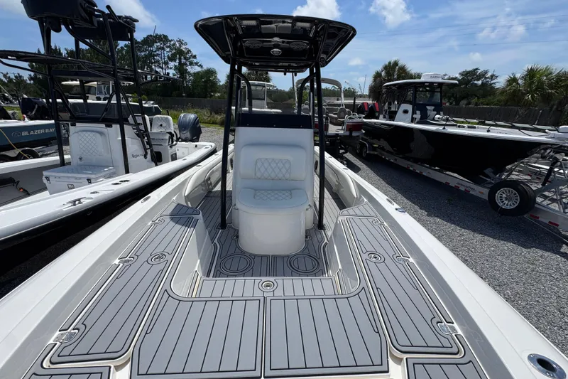 Slide: The Image of 2019 ShearWater 270 Carolina Flare boat with sleek deck design and modern seating. - 19
