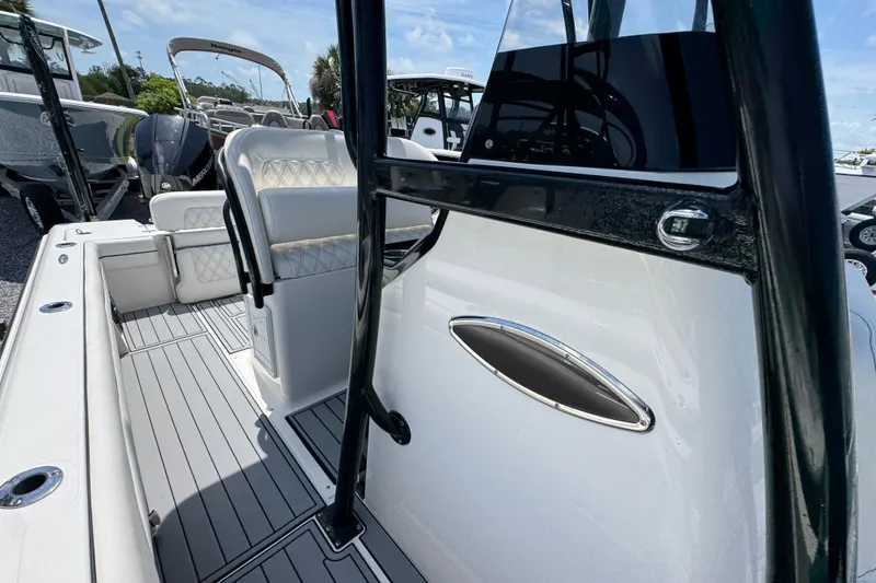 Slide: The Image of 2019 ShearWater 270 Carolina Flare boat interior with sleek seating and modern design. - 21